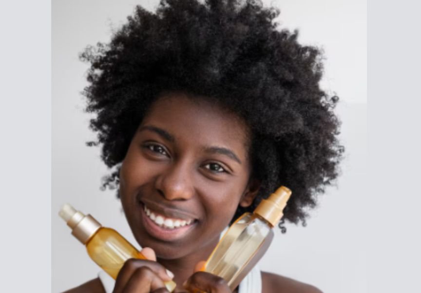 A lady using Moringa Oil for Hair