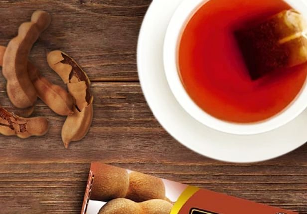Tamarind tea bags brewing in a cup